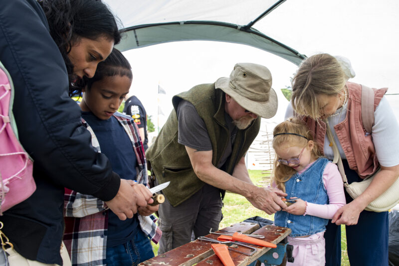Visitors taking part in an activity at the Royal Highland Show.